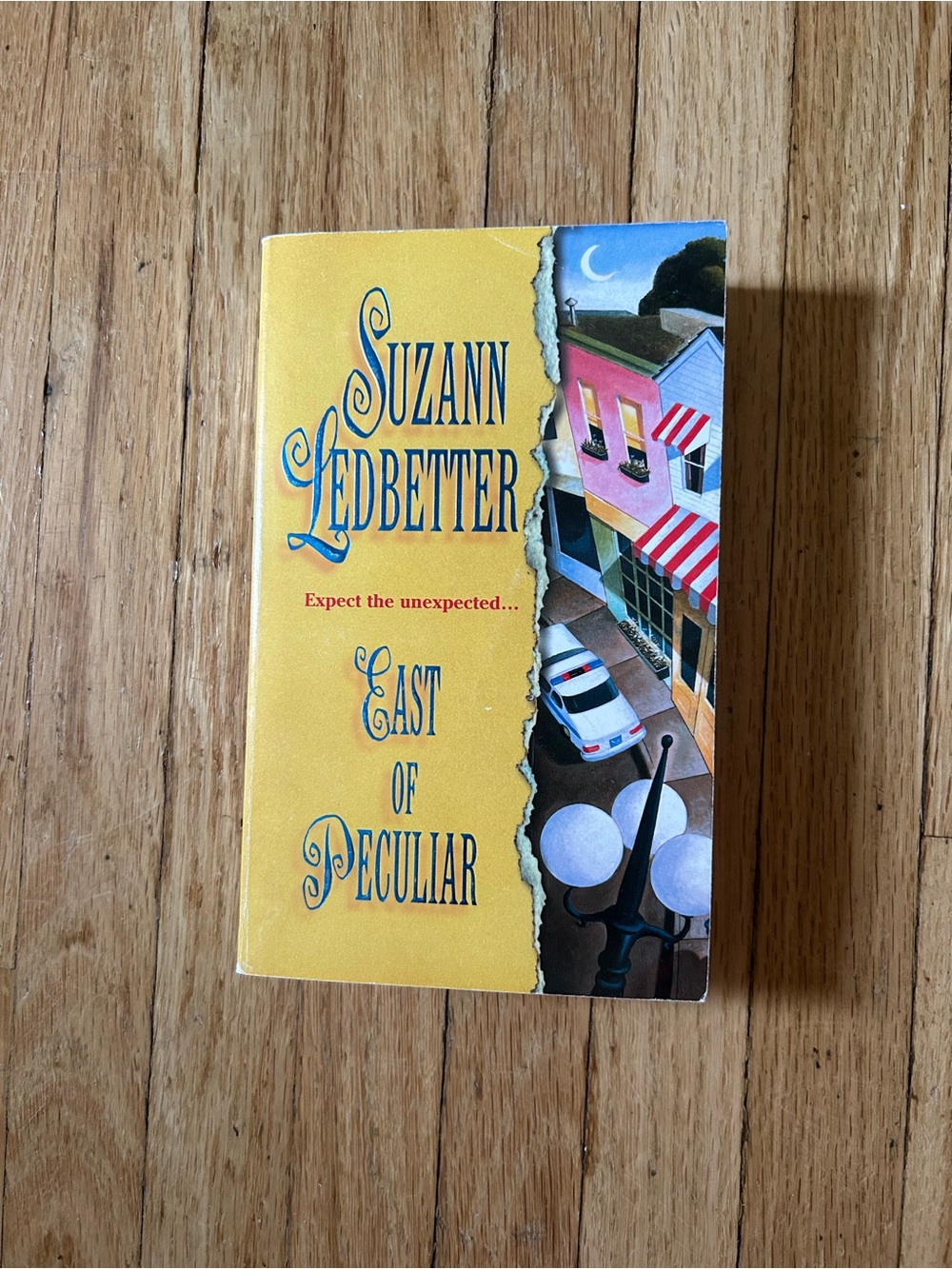 "East of Peculiar" Yellow Paperback Book